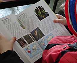 Photo of Macoun member with "Being a Bird in North America"